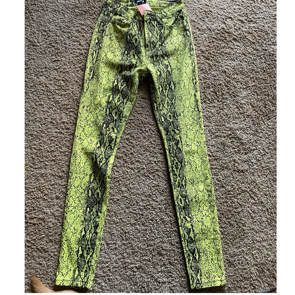 Neon snake skin skinny jeans